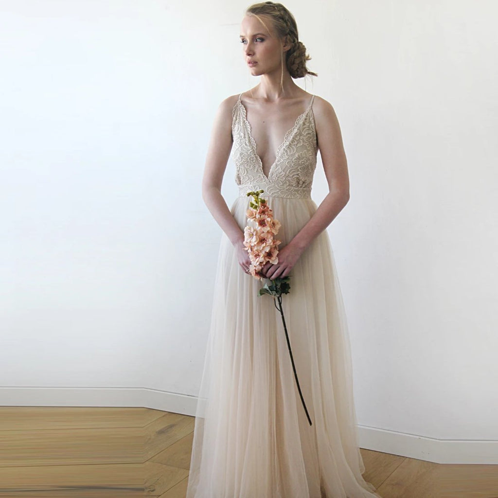 Full front view of Champagne Lace and Tulle Wedding Dress showing the deep V-neck lace bodice and flowing flowing floor-length skirt.