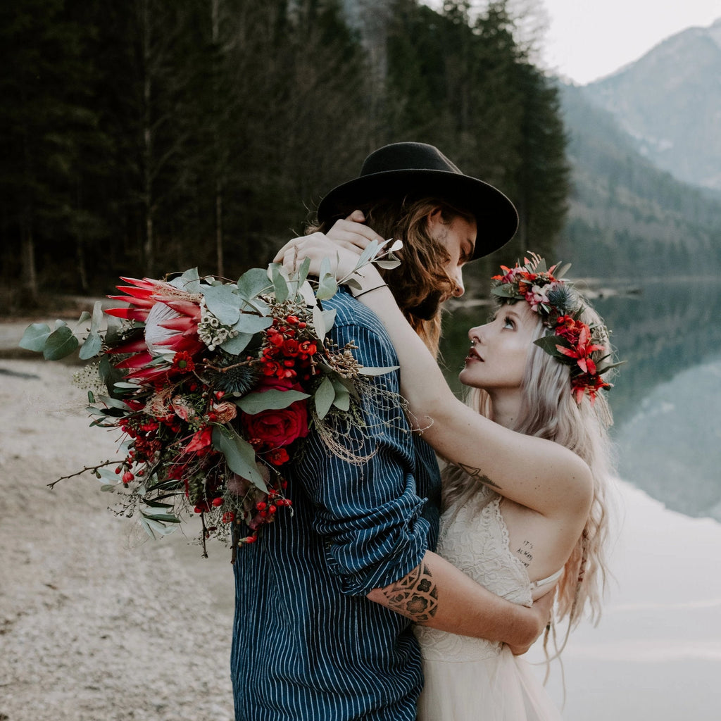 Bride wearing the Champagne Lace Tulle Wedding Dress, embracing her partner beside a mountain lake.