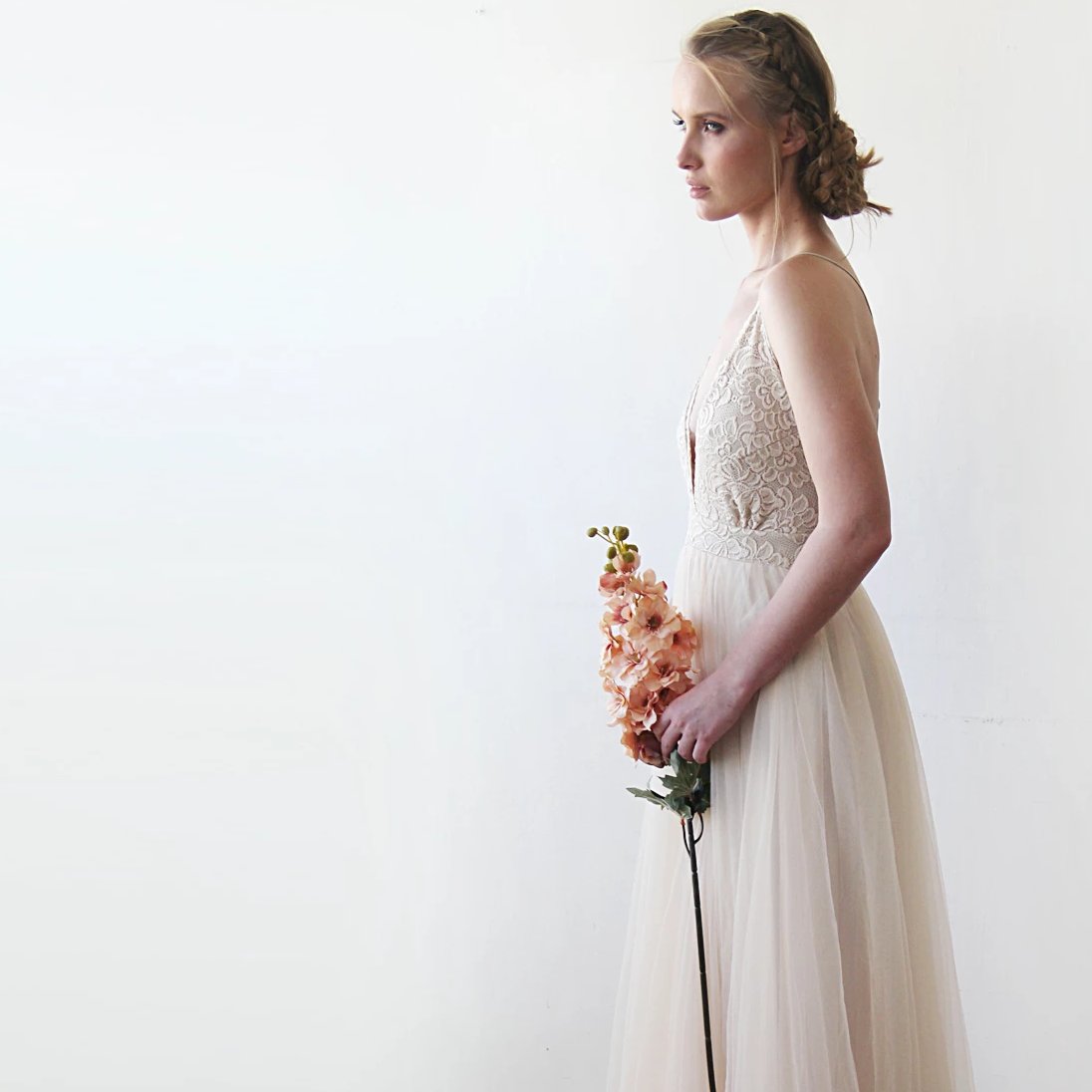 Side Profile of the Champagne Lace and Tulle Wedding showing the fitted lace bodice and flowing tulle skirt.